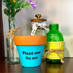 Handcrafted, hand painted Blue terracotta Pot with logo